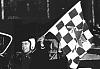 Click image for larger version. 

Name:	Photo #3. Bruno Brackey holding (Mobil's Flying Red Horse logo) (35 B&W blocks) checkered flag.jpg 
Views:	217 
Size:	42.9 KB 
ID:	1312